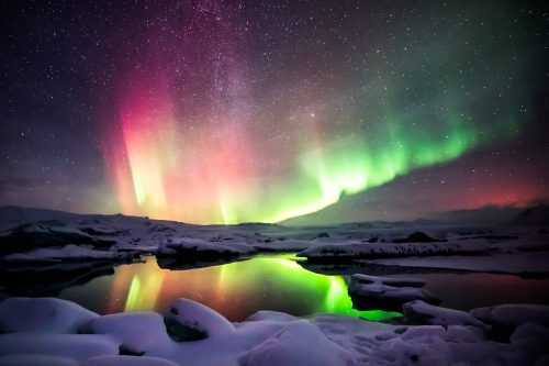 A,Beautiful,Green,And,Red,Aurora,Dancing,Over,The,Jokulsarlon island jokulsarlon 241717330 500x0 c default