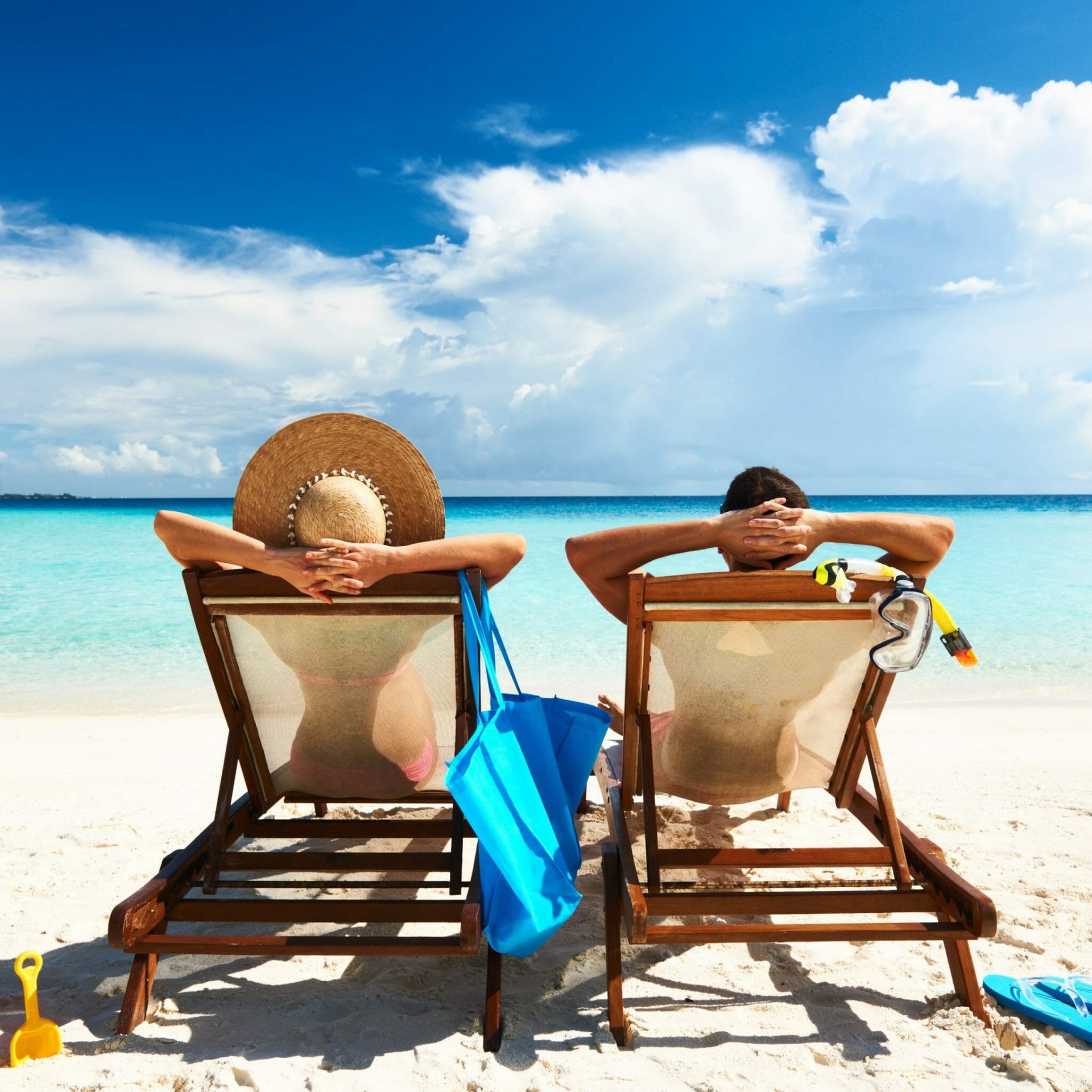 Couple,On,A,Tropical,Beach,At,Maldives