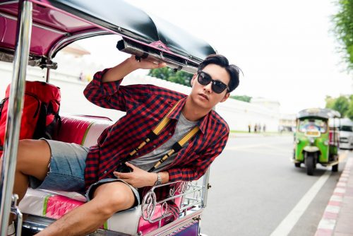 Young,Handsome,Asian,Tourist,Man,Riding,Local,Tuktuk,Taxi,While