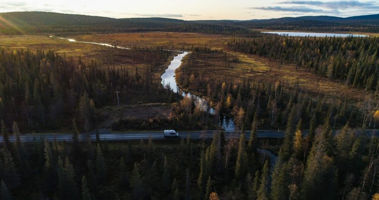 Camper,Van,In,A,Autumn,Forest,In,Lappland,,Aerial,Drone
